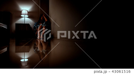 Depression woman alone in the dark room.  43061516