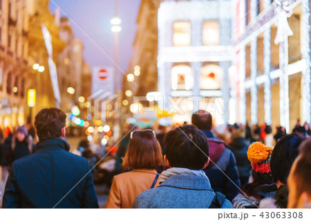 people crowd walking on busy street people crowd walking on busy street 43063308