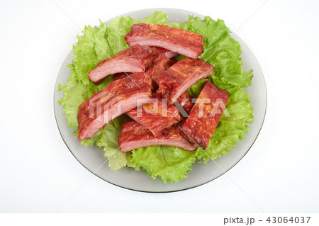 Grilled pork ribs isolated on white background Grilled pork ribs isolated on white background 43064037