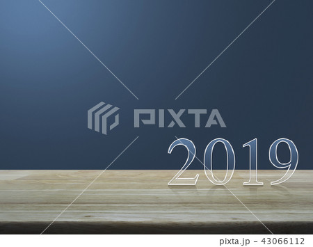 Happy new year 2019 text on wooden table Happy new year 2019 text on wooden table 43066112