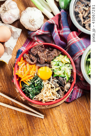 Bibimbap - rice with beef and vegetables Bibimbap - rice with beef and vegetables 43067281