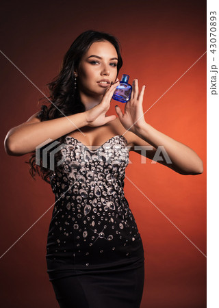 Elegant beautiful luxurious woman with perfume  43070893