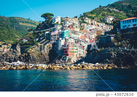 Scenic view of colorful village Riomaggiore. Scenic view of colorful village Riomaggiore. 43072610