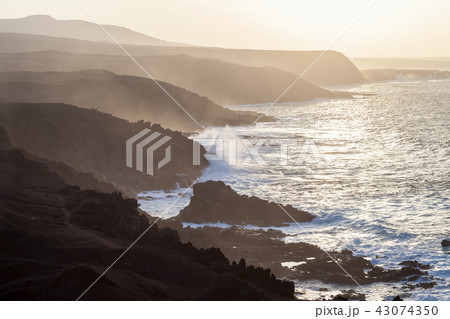 view of mountains and atlantic ocean on sunset view of mountains and atlantic ocean on sunset 43074350