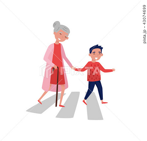 Polite boy helps elderly woman to cross the road. Cheerful school kid and old lady. Child with good 43074699
