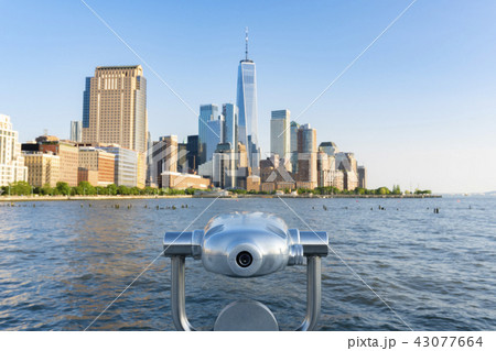 Tower telescope facing Manhattan skyline in New York City Tower telescope facing Manhattan skyline in New York City 43077664