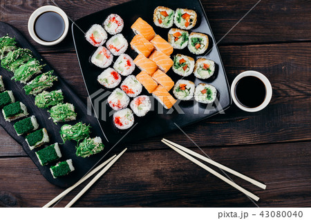 Variety of Japanese sushi rolls, flat lay Variety of Japanese sushi rolls, flat lay 43080040