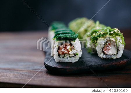 sushi rolls with chuka and green tobiko caviar sushi rolls with chuka and green tobiko caviar 43080169