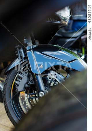 Vintage motorcycle parking on the road. Side view, close up Vintage motorcycle parking on the road. Side view, close up 43085514