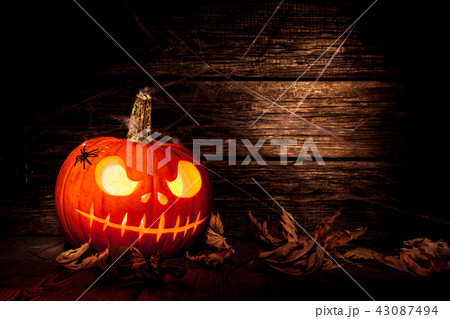 Halloween pumpkin head jack on wooden background Halloween pumpkin head jack on wooden background 43087494