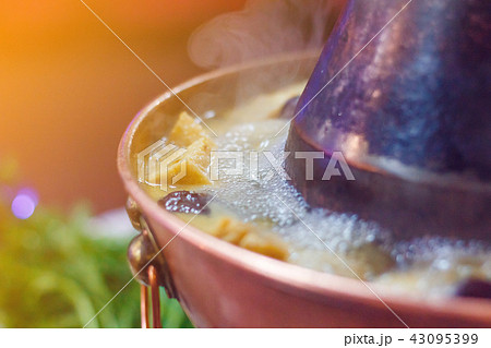 Double flavor hot pot on the table 43095399