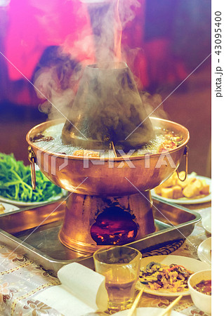 Asian double flavor hot pot on the table 43095400