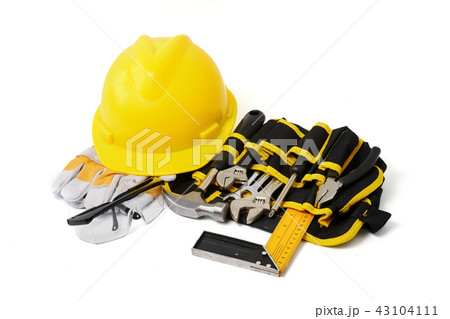 Construction safety equipment and tools on white background. Construction safety equipment and tools on white background. 43104111