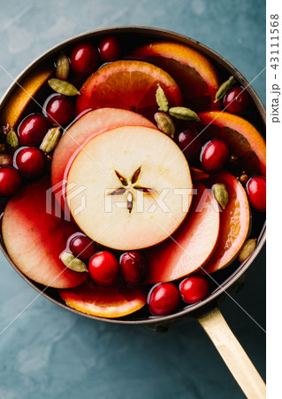 Mulled wine with fruits in saucepan Mulled wine with fruits in saucepan 43111568