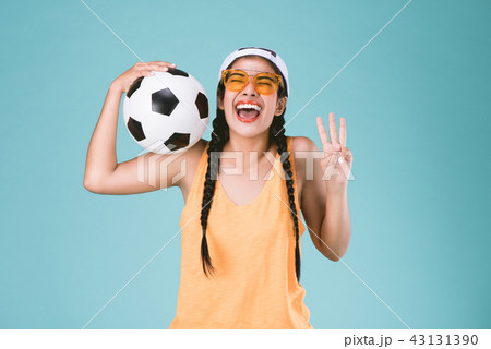 sport woman holding a soccer ball 43131390