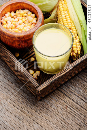 Corn milk in glass Corn milk in glass 43132312