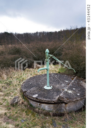 Old pump, water shortage scarcity concept Old pump, water shortage scarcity concept 43144452