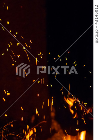 Night bonfire with sparks 43146012