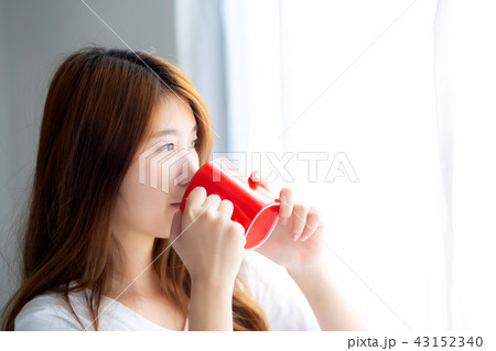 Beautiful portrait young asian woman with drink 43152340