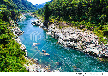 Tsunasosegawa Bridge And Gokasegawa Hinokage Stock Photo