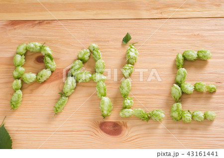 The inscription pale with hop cones on wooden  43161441