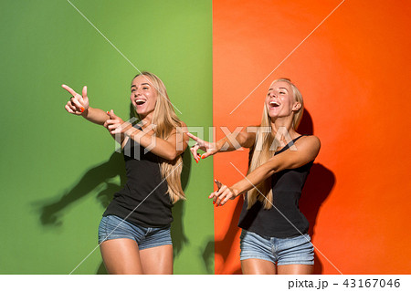 The happy women point you and want you, half length closeup portrait 43167046