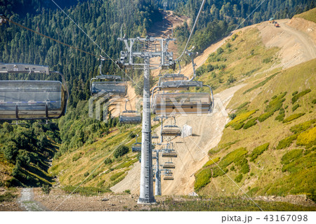 Photo of two funiculars amidst mountain hills Photo of two funiculars amidst mountain hills 43167098