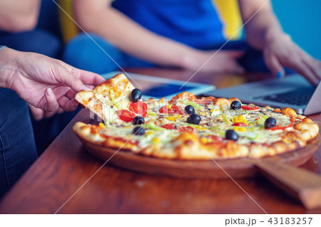 Mock up freelancer workplace. Tablet PC, cell phone and pizza. Top view image. Fast pizza delivery 43183257