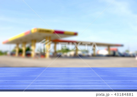 top desk with blur fueling station background top desk with blur fueling station background 43184881