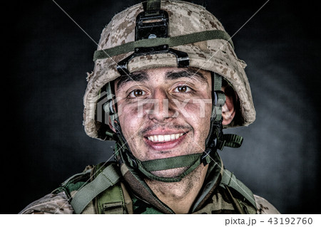 Marine machine gunner with ammo belts on chest Marine machine gunner with ammo belts on chest 43192760