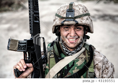 Equipped marine posing with service carbine rifle 43193551