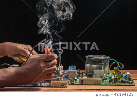 Computer motherboard repair by soldering Computer motherboard repair by soldering 43194325