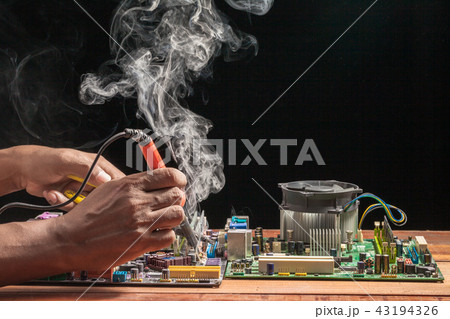 Computer motherboard repair by soldering Computer motherboard repair by soldering 43194326