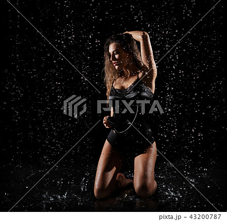 Woman with water drops Woman with water drops 43200787
