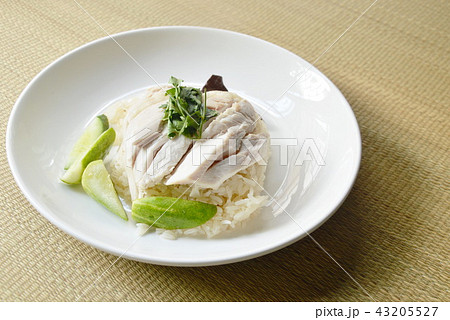 steamed rice topping boiled chicken on bamboo mat steamed rice topping boiled chicken on bamboo mat 43205527