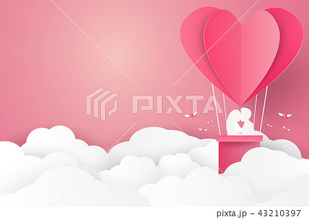 Couple kissing on hot air balloon in a heart shape 43210397