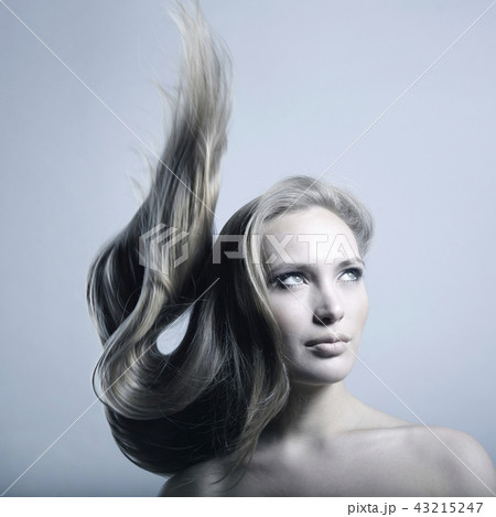 Beautiful woman with magnificent hair Beautiful woman with magnificent hair 43215247