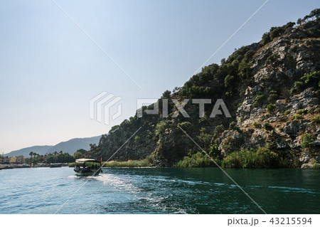River trip along rocky green coast in Turkey view 43215594