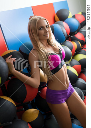 Sexy blonde in sports undewear shot in a gym 43215595