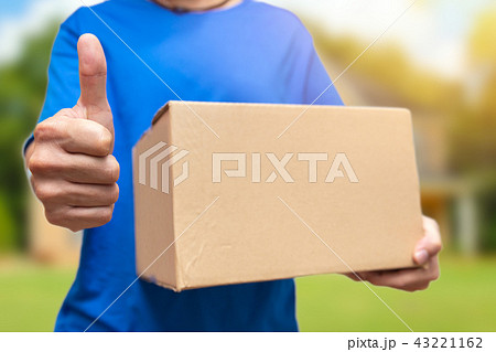 good item or best shipping fast man holding box good item or best shipping fast man holding box 43221162