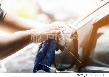 human hand showing cleaning car human hand showing cleaning car 43223842
