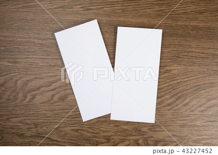 Blank flyer over wooden background Blank flyer over wooden background 43227452