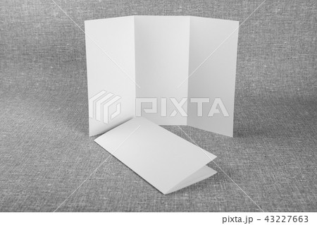 Mockup of white booklet on gray background. Mockup of white booklet on gray background. 43227663