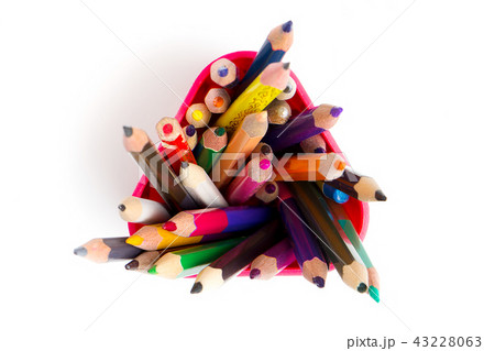 Color pencils in a glass top view on a white background Color pencils in a glass top view on a white background 43228063