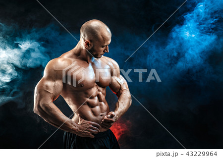 Strong bodybuilder man with perfect abs, shoulders,biceps, triceps, chest 43229964