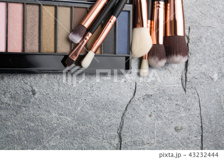 various makeup products on dark background 43232444