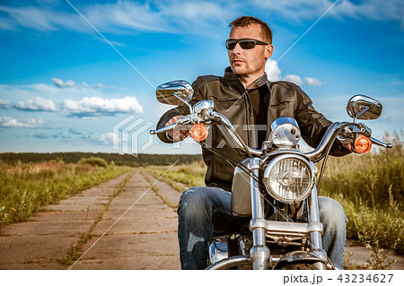 Biker on a motorcycle 43234627