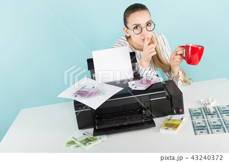 Attractive woman printing cash 43240372
