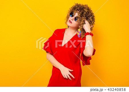 Attractive woman with short curly hair 43240858