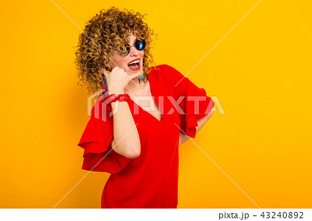Attractive woman with short curly hair Attractive woman with short curly hair 43240892
